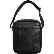 Handtas Calvin Klein Jeans Emblem Aop Emboss Reporter