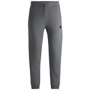 Pantalon BOSS BAS DE SURVÊTEMENT GRIS EN COTON MÉLANGÉ AVEC LOGO REVIS...