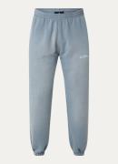 Represent Patron Of The Club tapered fit joggingbroek met verwassen af...