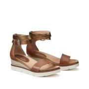 Sandalen met sleehak in leer