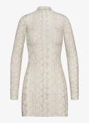 SKIMS Milky Sheer semi-transparante longsleeve met print