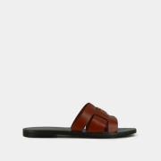 Mules plates en cuir Weil
