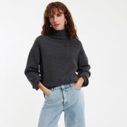 Pull col roulé en laine, grosse maille